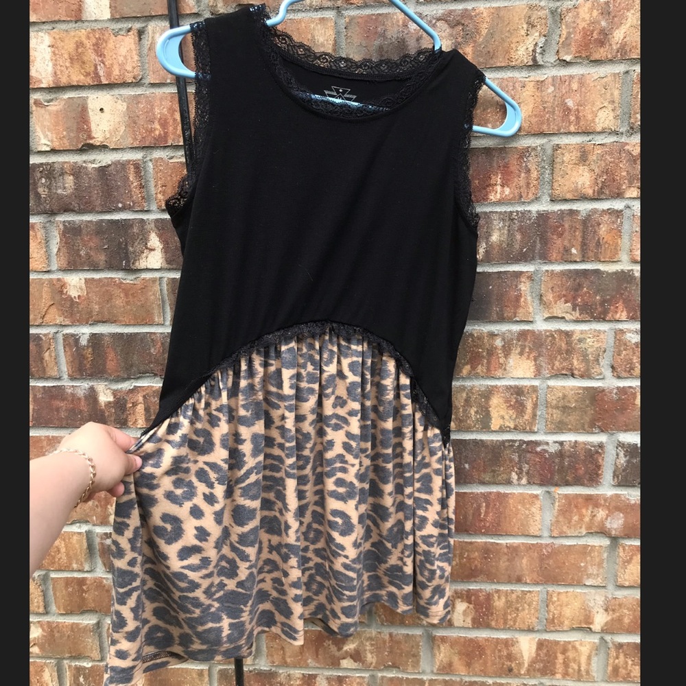 Black and leopard crazy train blouse size:M